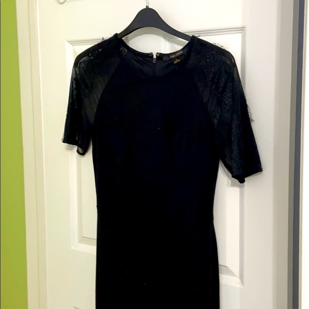 Short black dress.